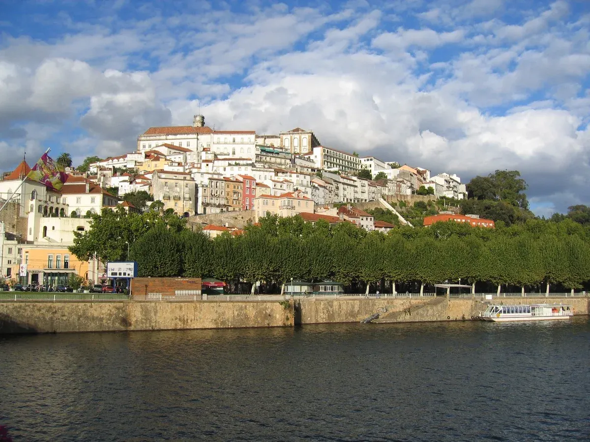 Coimbra old town above the Mondego river on a day trip from Porto